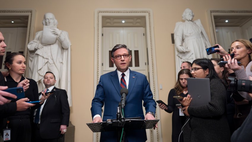 Speaker of the House Mike Johnson, R-La., talks briefly to reporters just before a vote on an interim spending bill to prevent a government shutdown, at the Capitol in Washington, Thursday, Dec. 19, 2024. The vote failed to pass.