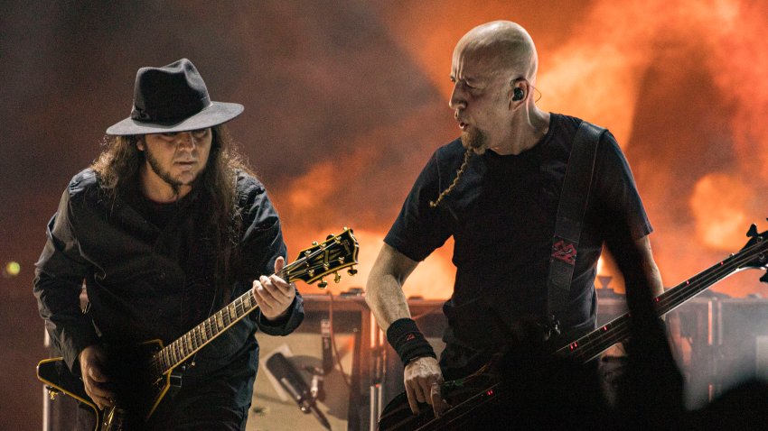 SAN DIEGO, CALIFORNIA – FEBRUARY 01: Musicians Daron Malakian (L) and Shavo Odadjian of System of a Down perform on stage at Viejas Arena at San Diego State University on February 01, 2022 in San Diego, California. (Photo by Daniel Knighton/Getty Images)