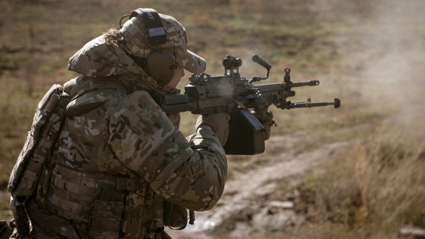 Roman, the commander of the unit shoots with a US-made light machine gun, M249 SAW known as Minimi as a drone unit from a battalion of the 24th Brigade of the Ukrainian Armed Forces receives training on shooting with various weapons, medical evacuations, and tactical medicine deployment in Donetsk region, Ukraine on October 26, 2024.