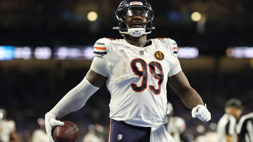 DETROIT, MICHIGAN – NOVEMBER 28: Gervon Dexter Sr. #99 of the Chicago Bears reacts after recovering a fumble during the second quarter against the Detroit Lions at Ford Field on November 28, 2024 in Detroit, Michigan. (Photo by Mike Mulholland/Getty Images)