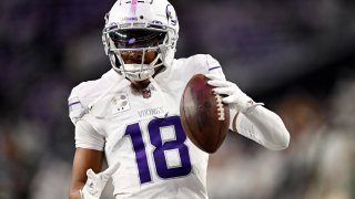 MINNEAPOLIS, MINNESOTA – DECEMBER 16: Justin Jefferson #18 of the Minnesota Vikings warms up prior to a game against the Chicago Bears at U.S. Bank Stadium on December 16, 2024 in Minneapolis, Minnesota. (Photo by Stephen Maturen/Getty Images)