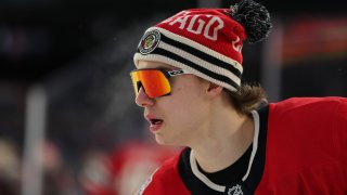 CHICAGO, ILLINOIS – DECEMBER 31: Connor Bedard #98 of the Chicago Blackhawks warms up prior to the 2024 NHL Winter Classic against the St. Louis Blues at Wrigley Field on December 31, 2024 in Chicago, Illinois. (Photo by Michael Reaves/Getty Images)
