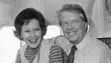 Married couple Rosalynn Carter and former Georgia governor Jimmy Carter, the Democratic presidential candidate, share a moment aboard his campaign plane