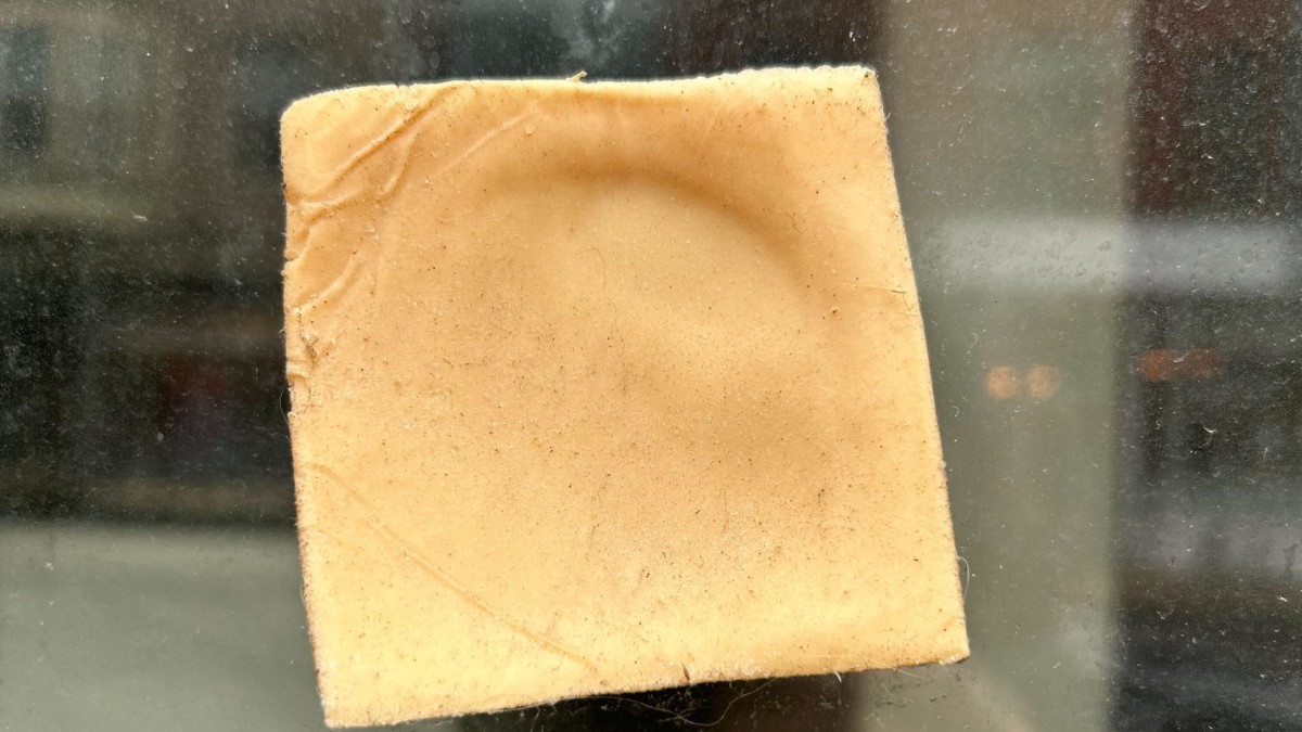 Slice of cheese stuck to storefront window in Chicago becomes viral sensation