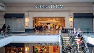 Shoppers walk into a Nordstrom department store in Austin, Texas, on March 3, 2023.