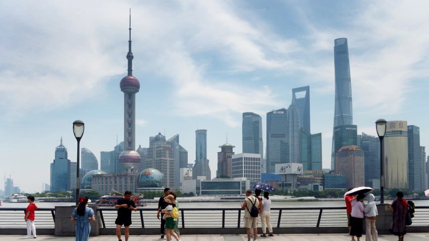 Tourists at the Bund on July 11, 2023 in Shanghai, China.