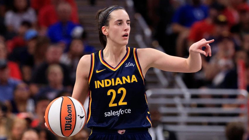 Caitlin Clark #22 of the Indiana Fever brings the ball up the court against the Dallas Wings at Gainbridge Fieldhouse on September 15, 2024 in Indianapolis, Indiana. 