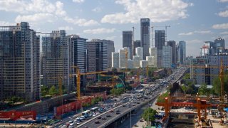 Bustling city, Dongsanhuan Ring Road, CBD, Beijing, China.  