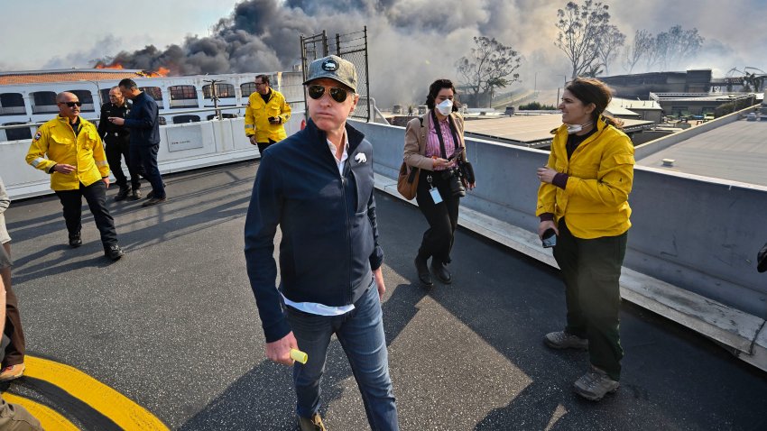 California Governor Gavin Newsom surveys damage in during the Palisades Fire