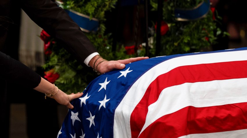 The Carter family pay their respects during a ceremony as the flag-draped casket of former President Jimmy Carter lies in state, at the Capitol, Tuesday, Jan. 7, 2025, in Washington. Carter died Dec. 29 at the age of 100.