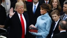 FILE: U.S. President-elect Donald Trump takes the oath of office as First Lady-elect Melania Trump, looks on during the 58th presidential inauguration in Washington, D.C., U.S., on Friday, Jan. 20, 2017.