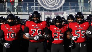 DEKALB, ILLINOIS – NOVEMBER 30: Northern Illinois Huskies players take the field before a game between the Northern Illinois Huskies and the Central Michigan Chippewas at Huskie Stadium on November 30, 2024 in DeKalb, Illinois.  (Photo by Geoff Stellfox/Getty Images)