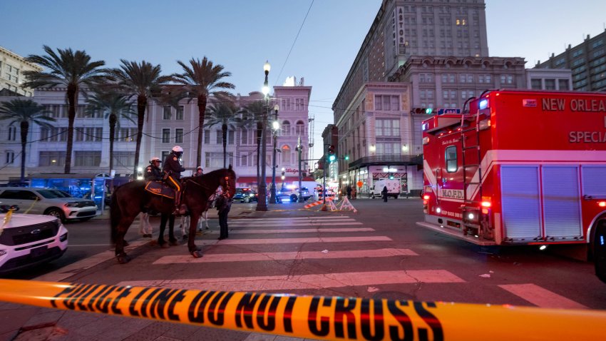 Police cordon off the intersection of Canal Street and Bourbon Street in the French Quarter of New Orleans, Louisiana, on January 1, 2025. At least 10 people were killed and 30 injured Wednesday when a vehicle plowed overnight into a New year’s crowd in the heart of the thriving New Orleans tourist district, authorities in the southern US city said. (Photo by Matthew HINTON / AFP) (Photo by MATTHEW HINTON/AFP via Getty Images)