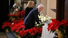 US President Joe Biden and First Lady Jill Biden place a candle, representing those killed, at the altar during an interfaith prayer service with the families and community members impacted by the January 1 truck attack in New Orleans, at the Cathedral-Basilica of Saint Louis, King of France, in New Orleans, Louisiana, on January 6, 2025. Biden is also scheduled to meet with the families of victims of the deadly truck-ramming attack that killed 14 people early on January 1. (Photo by ROBERTO SCHMIDT / AFP) (Photo by ROBERTO SCHMIDT/AFP via Getty Images)