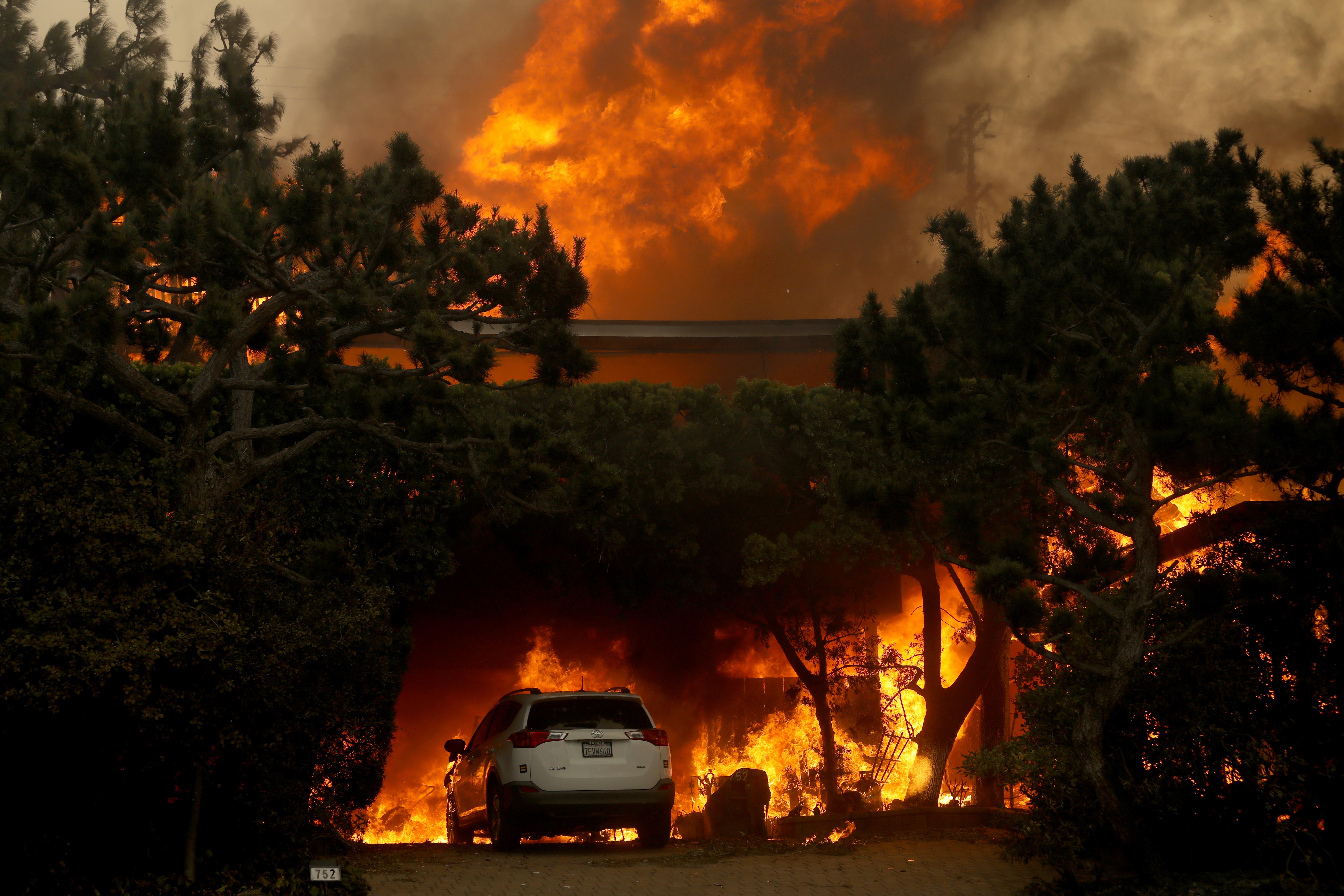 A home is fully engulfed by the Palisades fire along Haverford Avenue in Pacific Palisades on Jan. 7, 2025.