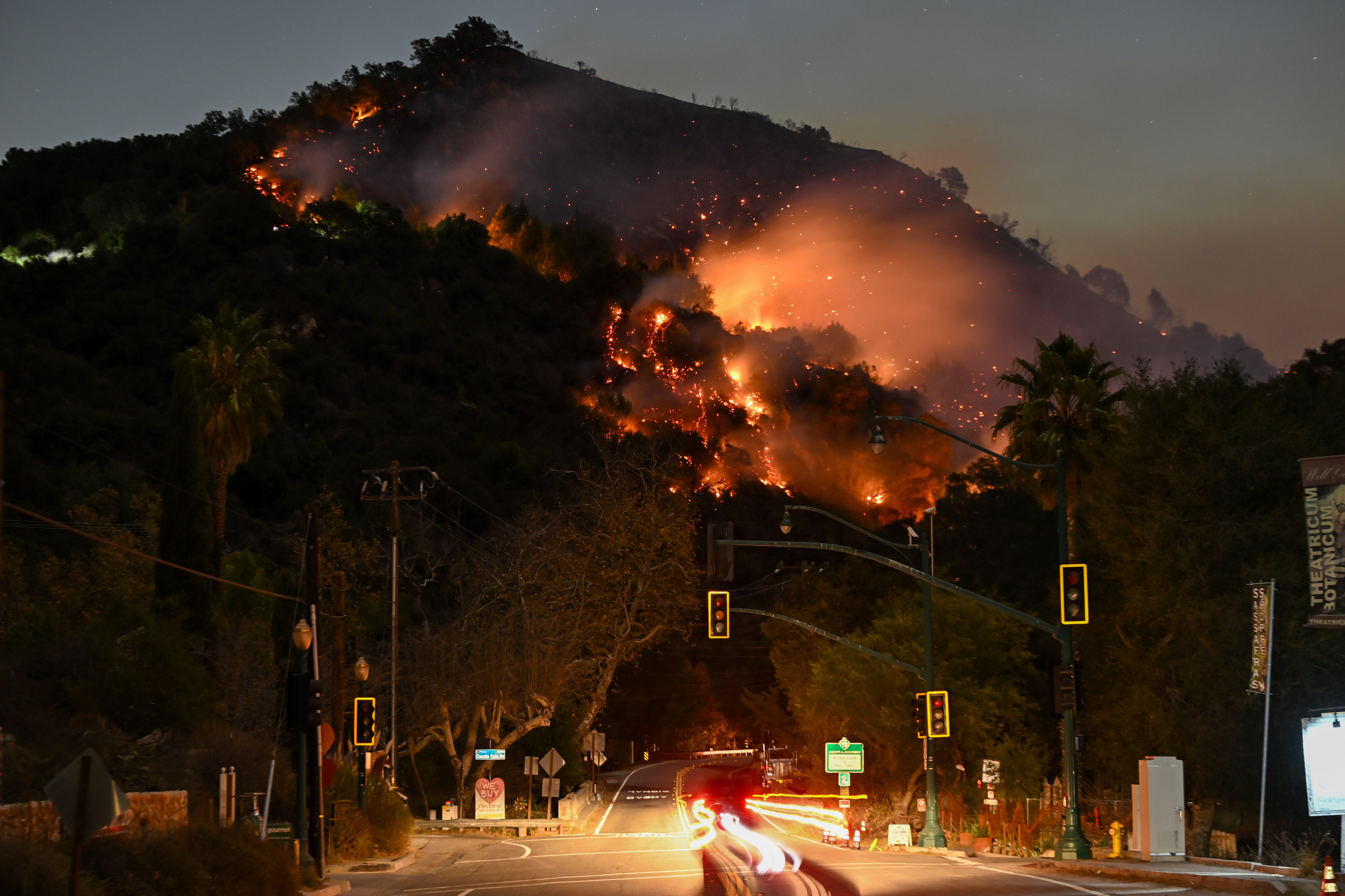 A view of flames at the mountain as seen from Topanga Canyon near Pacific Palisades in Topanga, Los Angeles, California, United States on January 9, 2025.