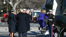 US President Donald Trump and First Lady Melania Trump participate in a departure ceremony for former President Joe Biden and former First Lady Jill Biden, before the Bidens board a helicopter outside the US Capitol in Washington, DC, on January 20, 2025. (Photo by Jim WATSON / AFP) (Photo by JIM WATSON/AFP via Getty Images)
