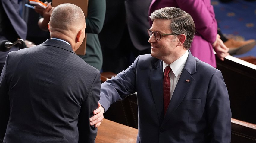 House Speaker Mike Johnson, R-La., right, speaks with House Minority leader Hakeem as the House of Representatives meets to elect a speaker and convene the new 119th Congress at the Capitol in Washington, Friday, Jan. 3, 2025.