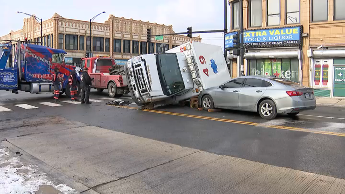 Ambulance strikes 2 vehicles after semi crash in West Englewood