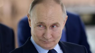 Russian President Vladimir Putin smiles during his meeting with workers, while visiting the AvtoVAZ automobile plant, January 28, 2025, in Togliatti, Russia. 