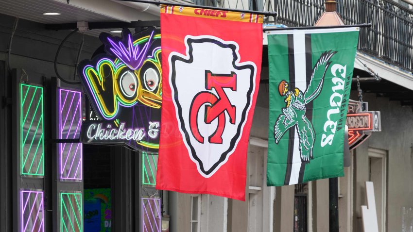 Kansas City Chiefs and Philadelphia Eagles flags at Voodoo Chicken & Daiquiris restaurant on Bourbon Street prior to Super Bowl LIX. 