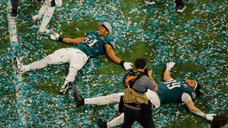 Football - NFL - Super Bowl LIX - Philadelphia Eagles v Kansas City Chiefs - Caesars Superdome, New Orleans, Louisiana, United States - February 9, 2025 Philadelphia Eagles' Jeremiah Trotter Jr. and Johnny Wilson make confetti angels as they celebrate after winning Super Bowl LIX.