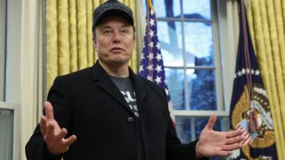 Elon Musk speaks next to President Donald Trump, not pictured, in the Oval Office of the White House in Washington, D.C., Feb. 11, 2025.