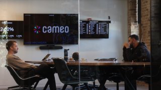 Chief Technology Officer Dom Scandinaro, left, and Steven Galanis, CEO, meet in a boardroom at Cameo, the Chicago-based celebrity video messaging company, on Feb. 13, 2025. 