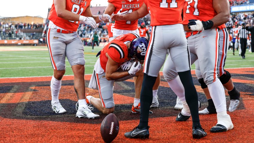 Jack Bech celebrates on one knee after scoring