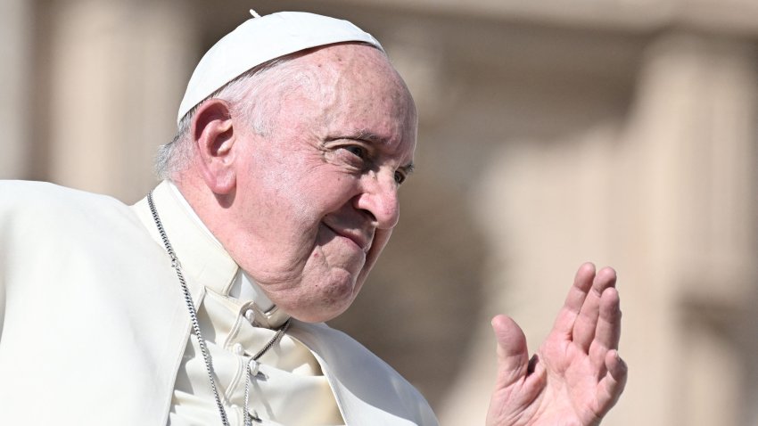 TOPSHOT – Pope Francis waves as he leaves at the end of his weekly general audience on St.Peter’s square on October 11, 2023. (Photo by Tiziana FABI / AFP) (Photo by TIZIANA FABI/AFP via Getty Images)