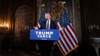 Donald Trump speaks to members of the media during a press conference at the Mar-a-Lago Club