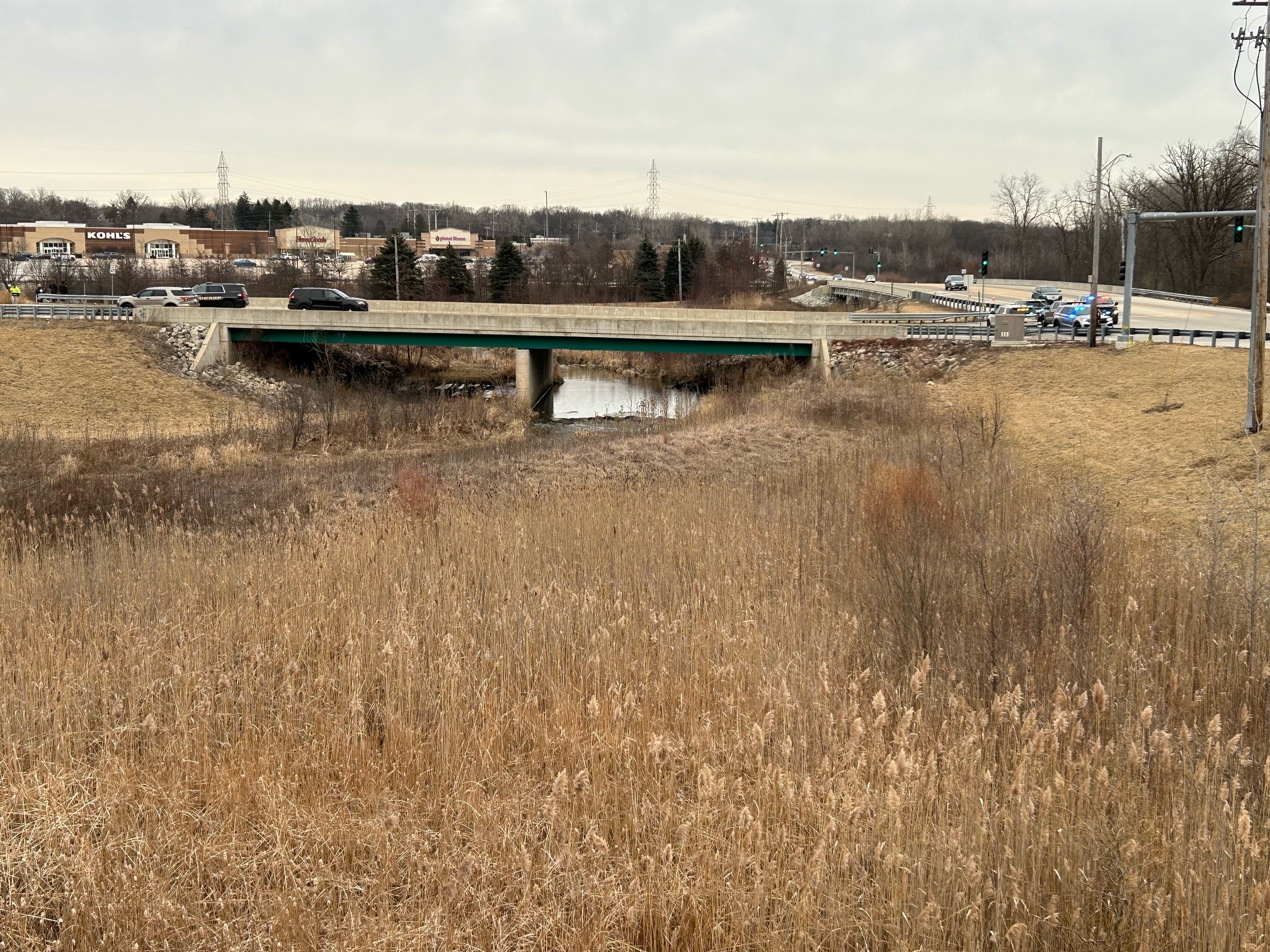 1 killed after car in southwest suburbs goes into retention pond; public asked to avoid area