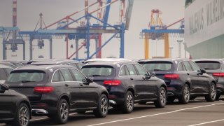Mercedes-Benz cars wait to be shipped at the harbor in Bremerhaven, nothern Germany, on June 1, 2018.