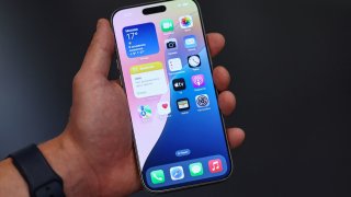 A man holds an Apple iPhone 16 Pro Max ahead of the launch of sales of the new iPhone 16 series smartphones in a store in Moscow, Russia September 20, 2024. 