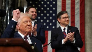 U.S. President Donald Trump arrives to address a joint session of Congress at the U.S. Capitol on March 4, 2025, with U.S. Speaker of the House Mike Johnson and Vice President JD Vance behind him.