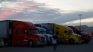 Cargo trucks remain in a parking lot, as some Mexican companies halt exports to the U.S., hoping for the tariffs to be reversed, in the outskirts of Ciudad Juarez, Mexico, March 5, 2025. 