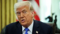 U.S. President Donald Trump delivers remarks with Defense Secretary Pete Hegseth (not pictured) in the Oval Office at the White House, in Washington, D.C., U.S., March 21, 2025. 