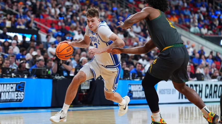 Cooper Flagg #2 of the Duke Blue Devils moves the ball against the Baylor Bears during the second round of the 2025 NCAA Men’s Basketball Tournament held at Lenovo Center on March 23, 2025 in Raleigh, North Carolina. 