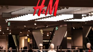 Consumers walk in front of H&M shop in Galeria Krakowska shopping mall in central Krakow, Poland on March 13, 2025. The country keeps its interest rates high as anyway high inflation is expected to rise again which affects the Polish economy. (Photo by Dominika Zarzycka/NurPhoto via Getty Images)