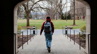 A person walks on campus at Muhlenberg College in Allentown, Pennsylvania, U.S. March 26, 2025. 