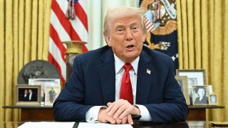 US President Donald Trump speaks as he signs an executive order in the Oval Office of the White House in Washington, DC, on March 31, 2025.