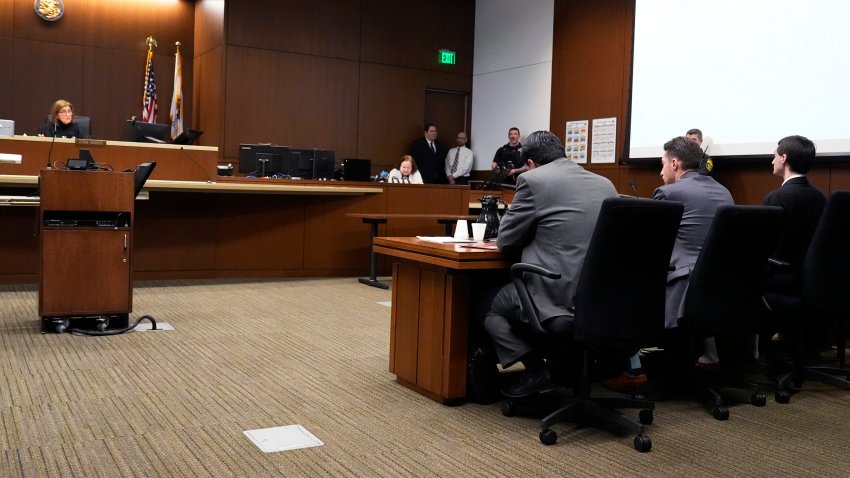 Robert E. Crimo III., right, listens to Judge Victoria A. RossettiÕs questions, left, during his trial in Judge Victoria A. RossettiÕs courtroom in Waukegan, Ill., Monday, March 3, 2025. (AP Photo/Nam Y. Huh, Pool)