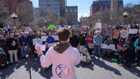 People listen to Griffin Gowdy, a PhD student at Columbia University,