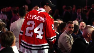 LAS VEGAS, NEVADA – JUNE 28: Artyom Levshunov walks to the team draft table after being selected second overall by the Chicago Blackhawks during the first round of the 2024 Upper Deck NHL Draft at Sphere on June 28, 2024 in Las Vegas, Nevada. (Photo by Dave Sandford/NHLI via Getty Images)