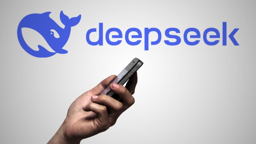 In this photo illustration, a DeepSeek logo is displayed on the backdrop