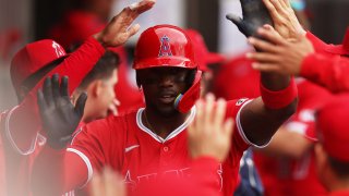 CHICAGO, ILLINOIS – MARCH 29: Jorge Soler #12 of the Los Angeles Angels celebrates his game-winning score with teammates in the dugout during the eighth inning against the Chicago White Sox at Rate Field on March 29, 2025 in Chicago, Illinois. (Photo by Geoff Stellfox/Getty Images)