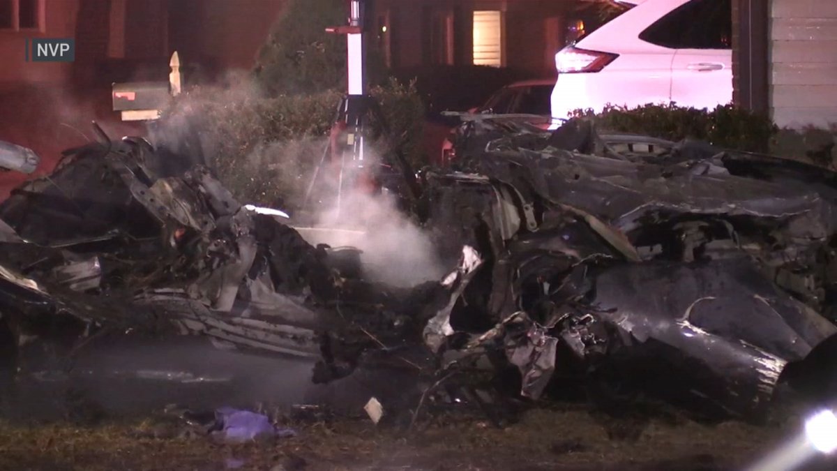 Shocking video shows speeding car crash into suburban home, burst into flames