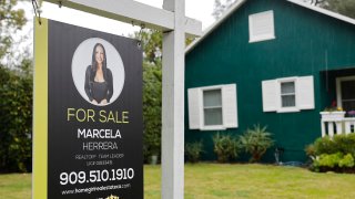 A ‘For Sale’ sign is posted in front of a home for sale on March 5, 2025 in Pasadena, California.