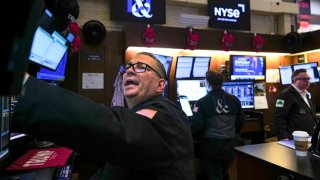 Traders work on the floor of the New York Stock Exchange (NYSE) on March 07, 2025 in New York City.