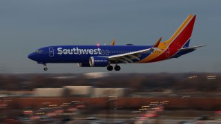 A Southwest Airlines jet approaches Midway Airport on Dec. 15, 2023, in Chicago. (John J. Kim/Chicago Tribune/Tribune News Service via Getty Images)